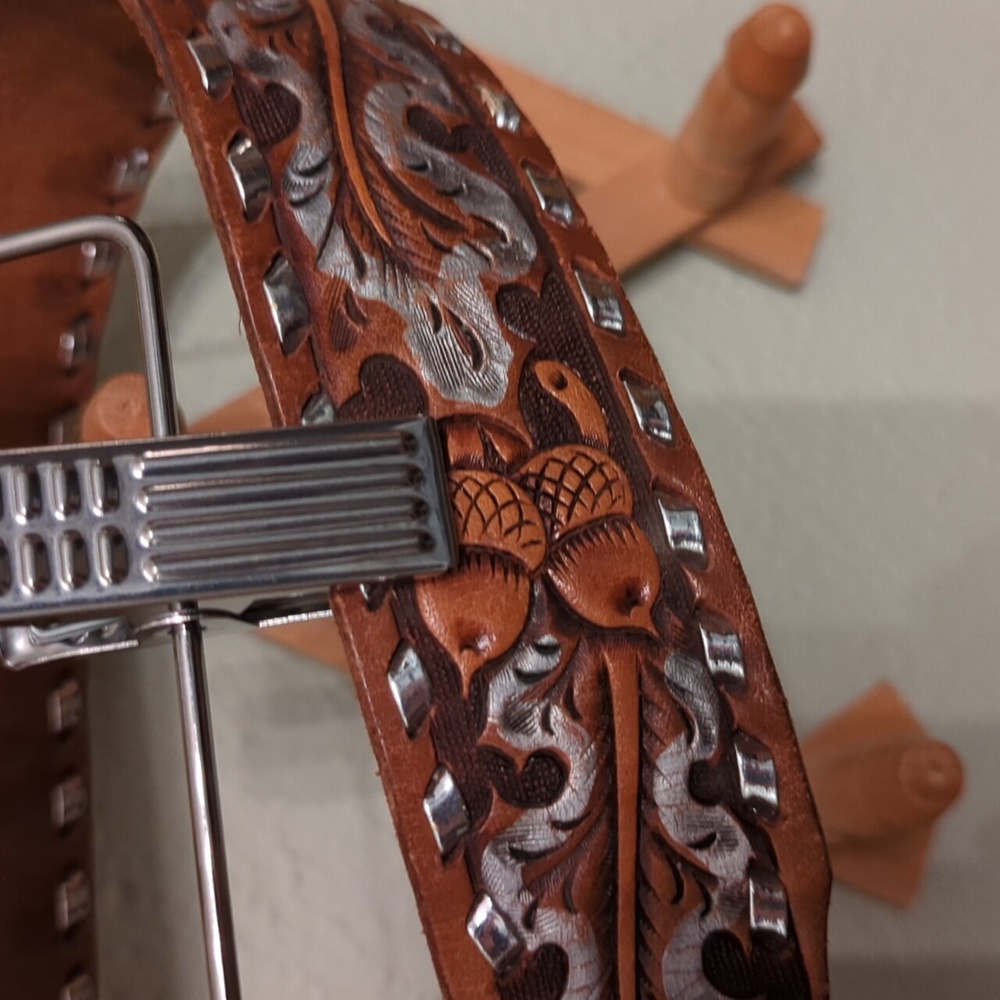 Unique acorn tooled leather belt with silver accents